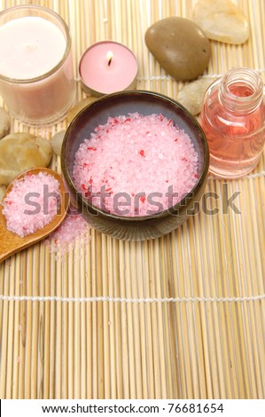 Spa composition â?? pink flowers, bowl of spa salt and stones
