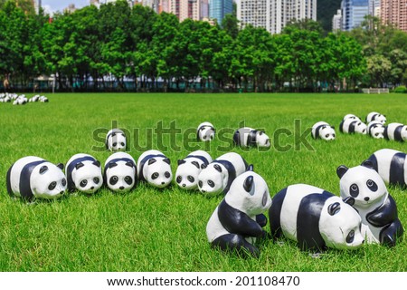 HONG KONG, JUNE 19: 1600 Pandas World Tour in Hong Kong  inVictoria Park on 19 June 2014. part of pandas world tour, designed by French artist Paolo Grangeon