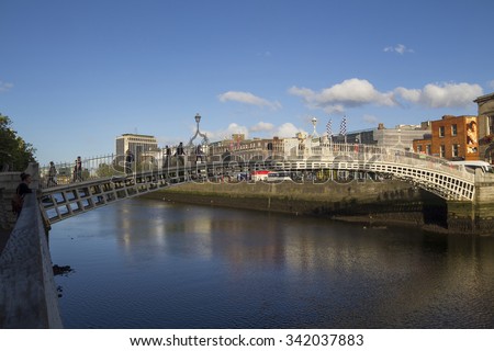 DUBLIN, IRELAND - AUGUST 03, 2015: City view of Dublin, capital of Ireland, with Ha\'penny bridge over the river Liffey on august 03, 2015