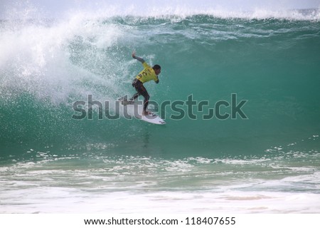 PENICHE, PORTUGAL - OCT 13: Heitor Alves riding a wave in round 1, heat 8 at WCT contest, Rip Curl Pro in Peniche, Portugal on October 13, 2012