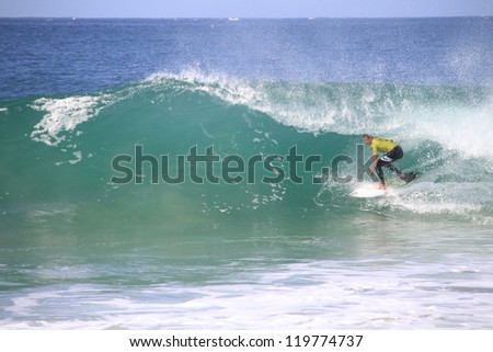 PENICHE, PORTUGAL - OCT 13: Kolohe Andino tube riding a wave in round 1, heat 6 at WCT contest, Rip Curl Pro in Peniche, Portugal on October 13, 2012