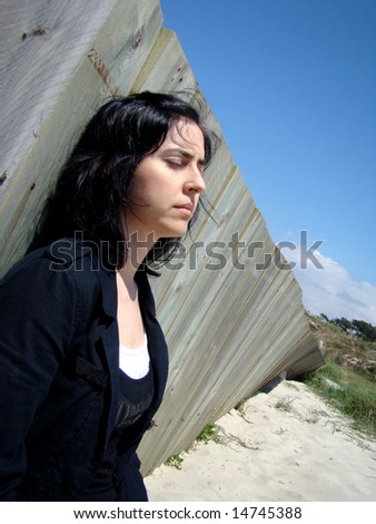 Depressed Woman - I need to rest in this beach it fells like the word is crashing me