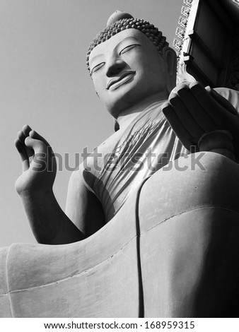 Buddhist statue at Wat Srisatong temple in Nakorn Pathom, Thailand.
