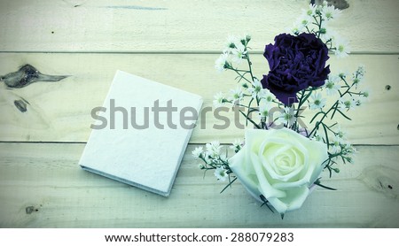 Romantic floral frame background/ Valentines day background/card and roses on wooden background