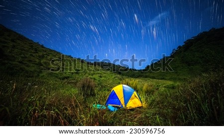 Camping at night with stars