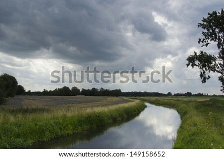 Threatening sky over a river in the Netherlands