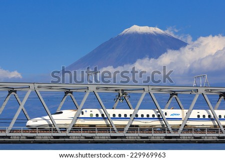 TOKYO - November 3: Shinkansen bullet train at Tokyo railway station in November 3, 2014 Tokyo, Japan. All trains stop at Tokyo, Yokohama, Nagoya, Kyoto, and Osaka.