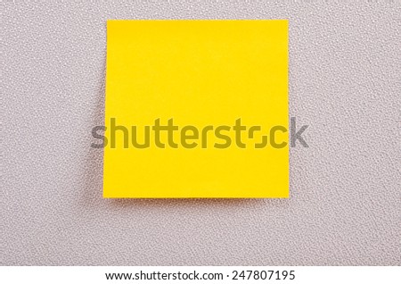 Post it on the partition on the table in the office