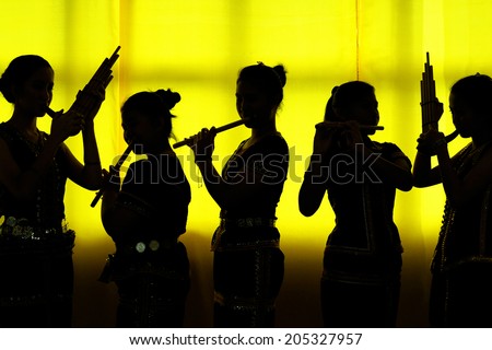 Tamparuli, Sabah Malaysia - November 25, 2012. A group of traditional music players practice bamboo music instrument called \
