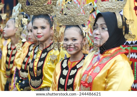 Kota Belud, Sabah Malaysia - October 18, 2014 : Bajau ladies in colorful traditional costume during Usunan festival on October 18, 2014 in Kota Belud Sabah, Malaysia.
