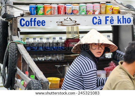 Cai Rang, Can Tho Vietnam. June 14, 2014 : Unidentified coffee hawker on stall boat at floating market Mekong River, Can Tho Vietnam on June 14, 2014.Coffee is number one drink across Vietnam.