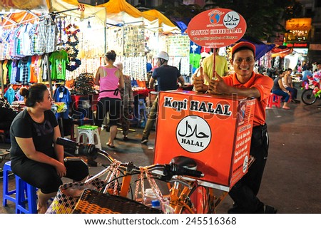 Ho Chi Minh, Vietnam - June 11, 2014.Unidentified coffee street vendor waits for customers in Ho Chi Minh city on June 11, 2014.Coffee is number one drink across Vietnam.