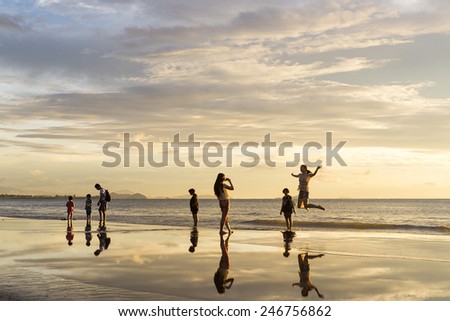 Tanjung Aru, Sabah Malaysia - January 13, 2015: Beach goes enjoying sunset at Tanjung Aru beach.Tanjung Aru beach is listed among ten best place to watch sunset in the world.