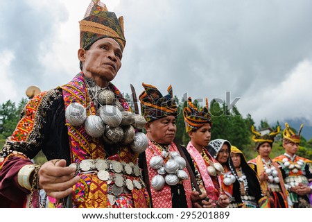 Kundasang Sabah, Malaysia - July 3, 2015:Shaman, Aman Sirom, 62, (left) head the ritual to appease the spirit of Akinabalu, the guardian of Mount Kinabalu.The rituals held after quake hit the mountain.