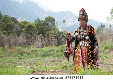 Kundasang Sabah, Malaysia - July 3, 2015:Shaman, Aman Sirom, 62, head the ritual to appease the spirit of Akinabalu, the guardian of Mount Kinabalu.The rituals held after quake hit the mountain.