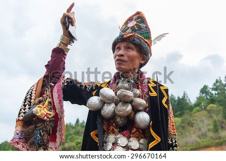 Kundasang Sabah, Malaysia - July 3, 2015:Shaman, Aman Sirom, 62, head the ritual to appease the spirit of Akinabalu, the guardian of Mount Kinabalu.The rituals held after quake hit the mountain.