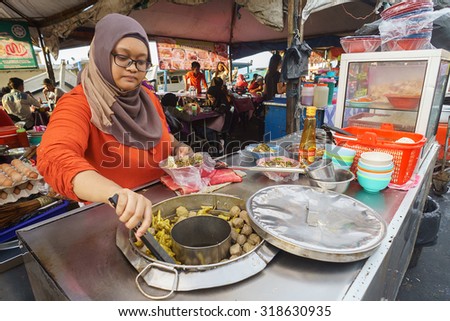 Kota Kinabalu Sabah Malaysia - September 20, 2015:Unidentified muslim food vendor preparing dish called Bakso at Kota Kinabalu waterfront.The famous dish is originated from  Indonesia.