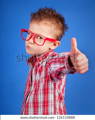 Cool five years old boy showing ok sign