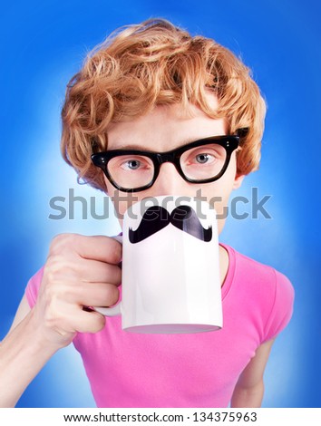 Funny nerdy guy drinking tea