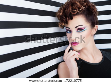 Face Close Up Of Beautiful Young Woman With Professional Party Make Up