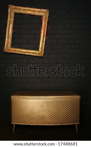 Gallery display - ornate frame, chest and kitch lights