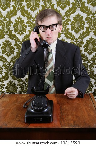 Retro office worker angry on the phone