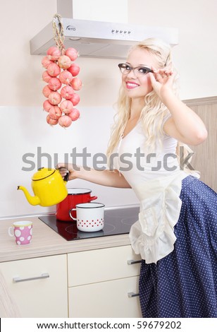 Cheerful housewife pouring tea, similar available in my portfolio