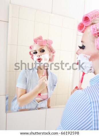 Attractive girl is having a shave, similar available in my portfolio