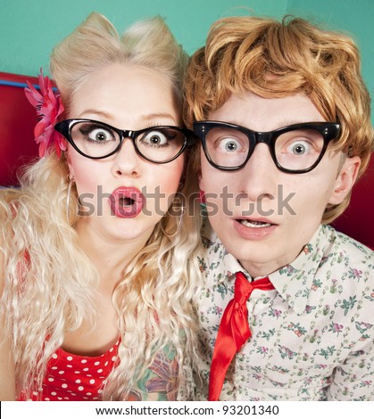 Funny surprised nerdy couple