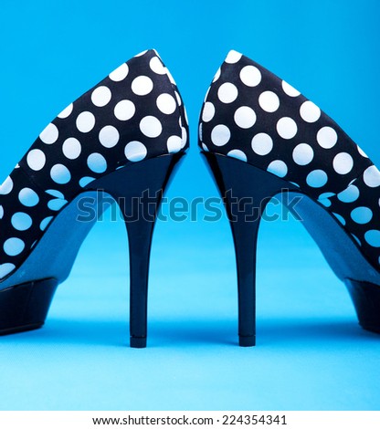 Dotted high heels shoes close up, fashion concept