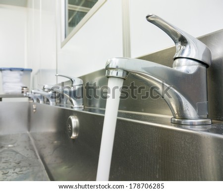 faucet row on the stainless sink
