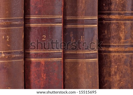 Old books in vertical row