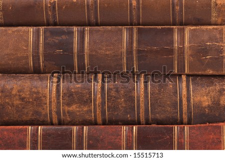 Old books in horizontal row