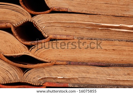 Open pages of old books in horizontal row