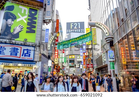 TOKYO, JAPAN - MAY 15: Crowds at the Shibuya, the famous fashion centers of Japan. MAY 15, 2016