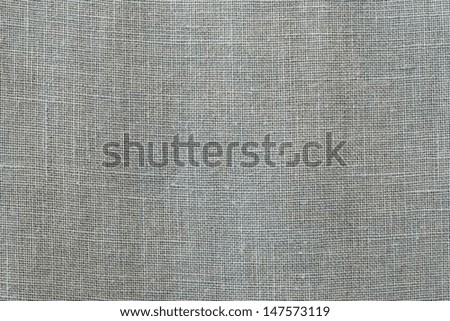 Texture of linen fabric of pale color for a background and a surface