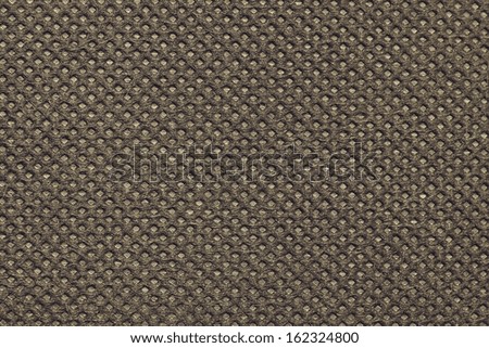 Texture of a corrugated interlacing of synthetic fabric for an abstract background