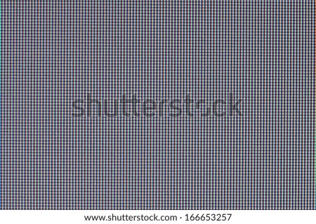 Texture of a surface of pixels of the liquid crystal monitor, closeup, for wallpaper and for an abstract background
