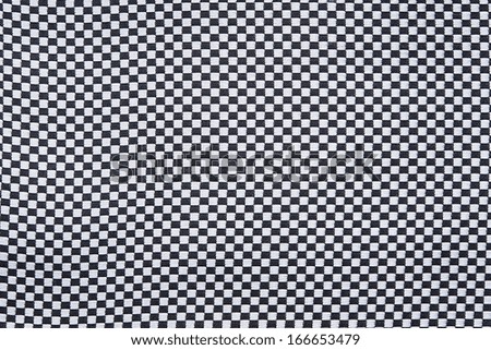 Texture of fabric in a chess cage, for monochrome wallpaper, for an abstract background,