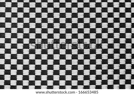 Texture of fabric in a chess cage, for monochrome wallpaper, for an abstract background,