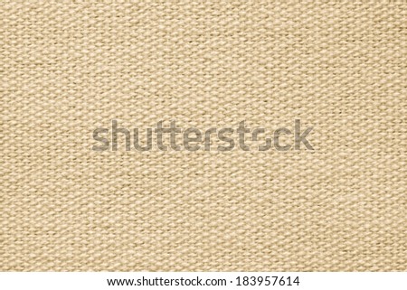 abstract background of beige coarse-grained texture of rough fabric with an interlacing