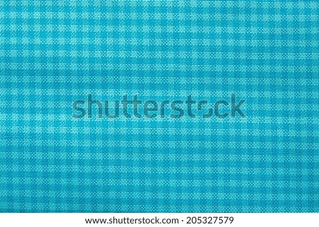 texture of textile checkered fabric of turquoise color for abstract backgrounds