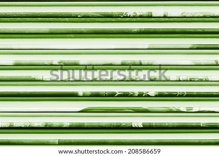 the motley abstract textured backgrounds green color end faces and edges of book covers