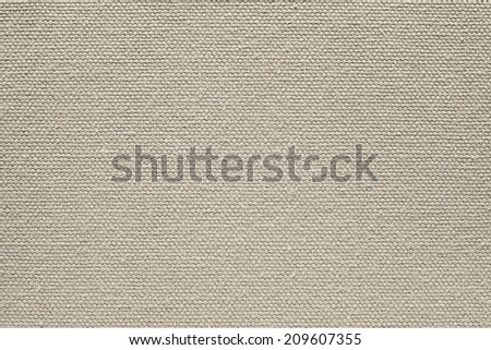 background from  textile fabric of a canvas of beige color with abstract texture from interlacings