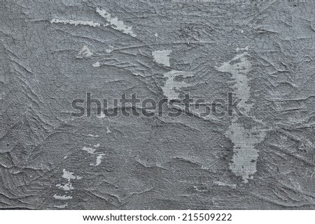 abstract texture of a shabby and worn-out old leather of silvery gray color