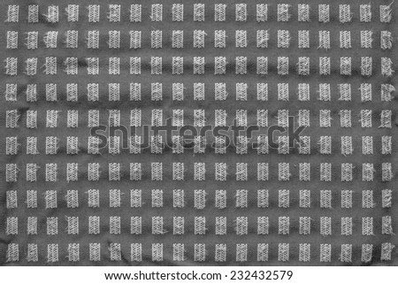 texture of grained checkered fabric of silvery gray color for empty and pure abstract backgrounds