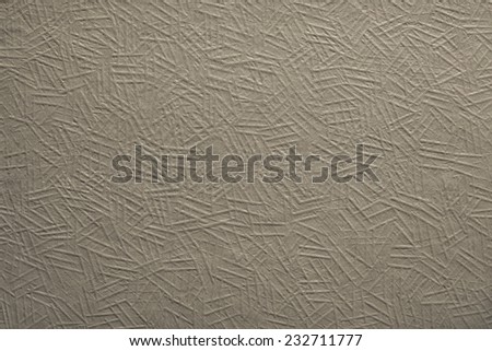 blank surface of the painted corrugated paper or cardboard of beige color for empty and the pure textured backgrounds