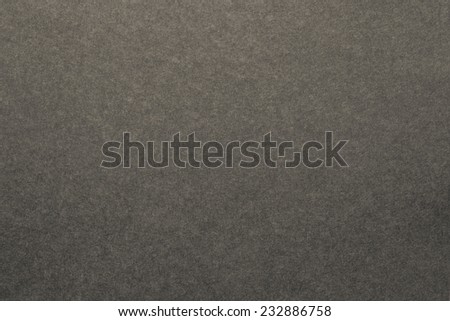 texture of beige color a brushed paper sheet for blank and pure backgrounds