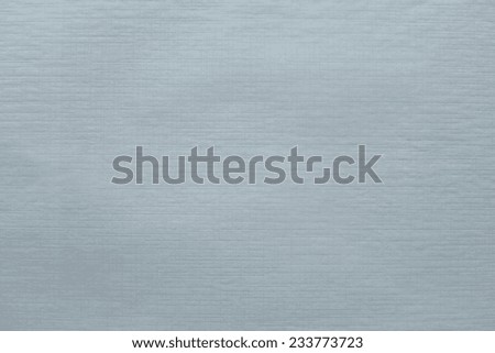 imprinted texture of blank thin glossy paper light silvery color for empty and pure backgrounds