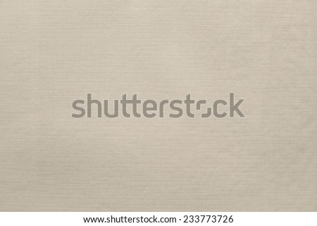 imprinted texture of blank thin glossy paper beige color for empty and pure backgrounds